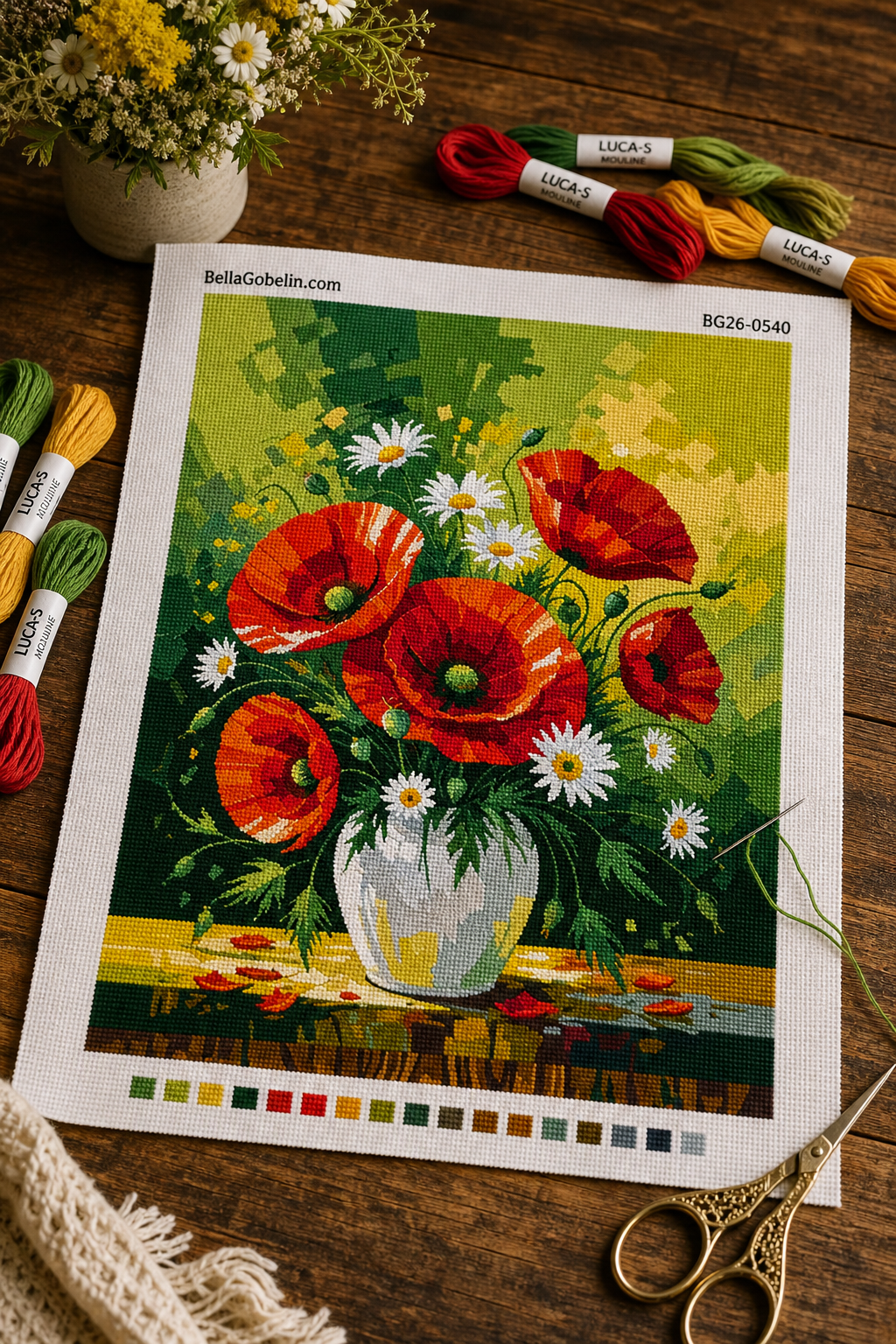 Valmuer og margueritter i en vase