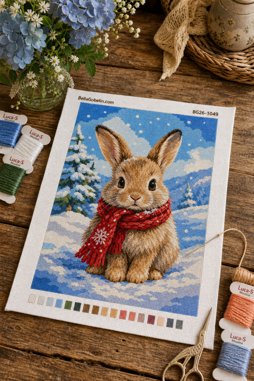 Winterkonijn met een rode sjaal